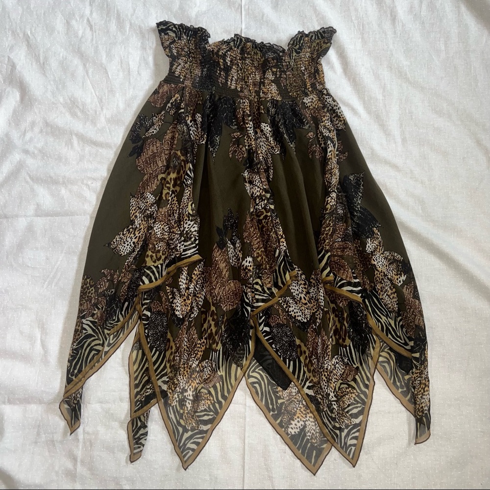 Caché brand multiple animal print skirt. Size small, silk lining